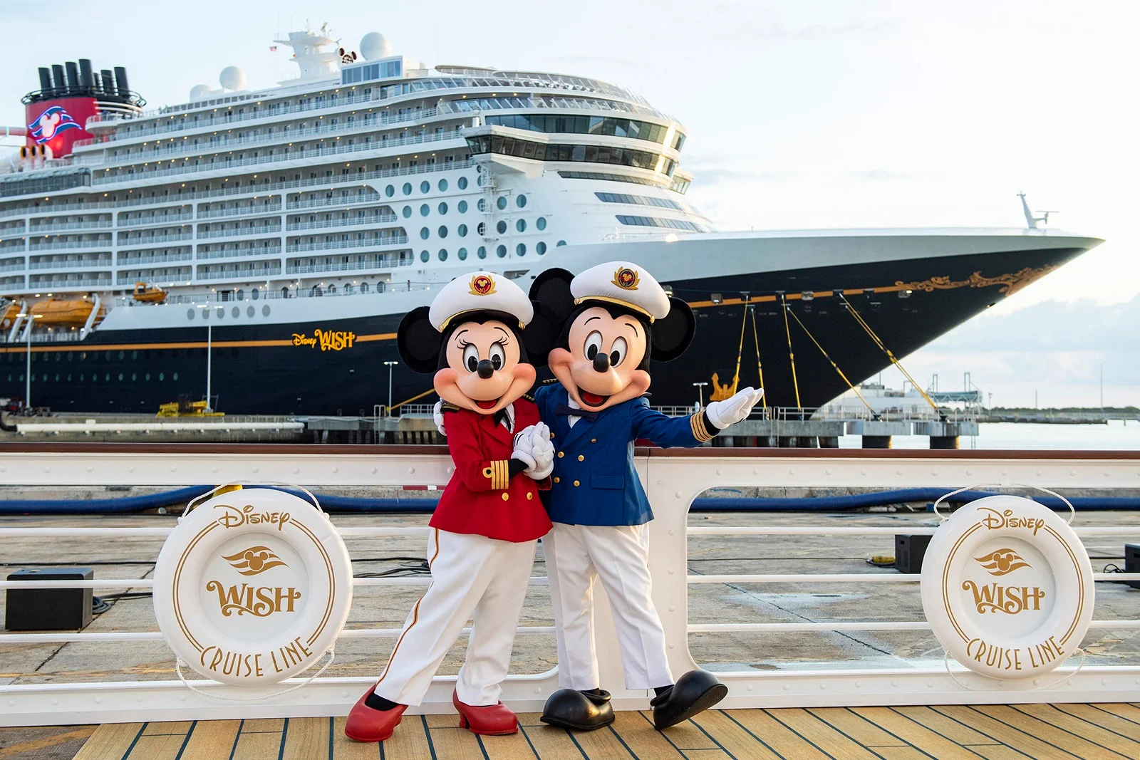 Mickey-and-Minnie-posing-with-the-new-disney-ship-the-disney-wish